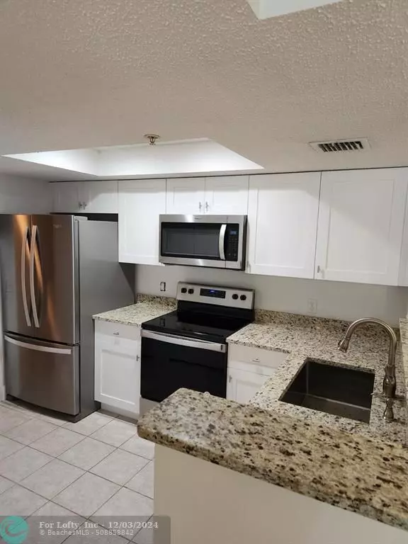 Coconut Creek, FL 33073,5041 WILES RD  #105