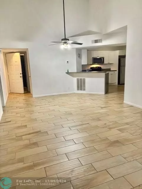 Coral Springs, FL 33067,8891 Wiles Rd  #306