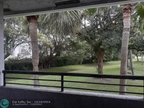 911 Lyons Rd  #2-207, Coconut Creek, FL 33063