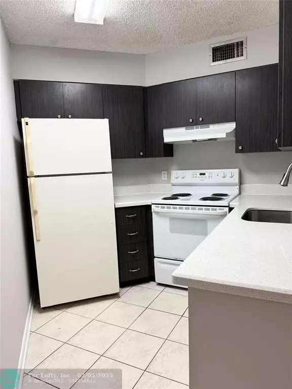 Oakland Park, FL 33309,213 Lake Pointe Dr  #107