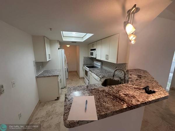 Coconut Creek, FL 33073,5065 Wiles Rd  #306