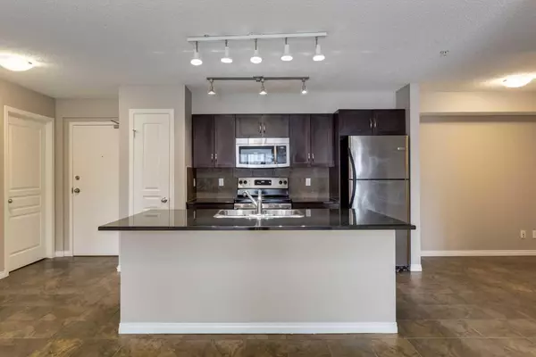 Calgary, AB T2Z 0T8,250 New Brighton Villas Southeast #215