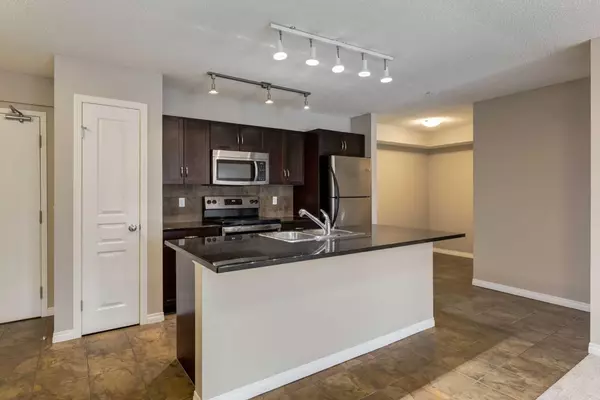 Calgary, AB T2Z 0T8,250 New Brighton Villas Southeast #215