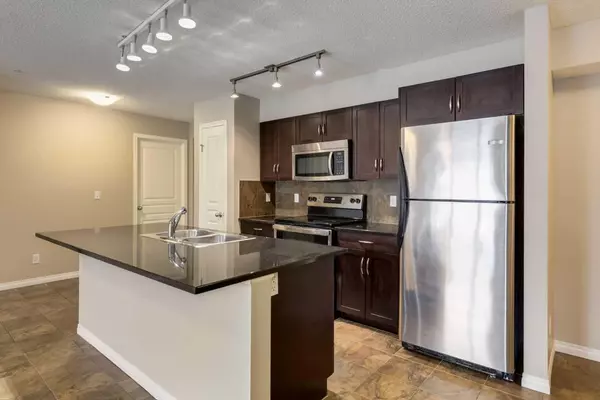 Calgary, AB T2Z 0T8,250 New Brighton Villas Southeast #215