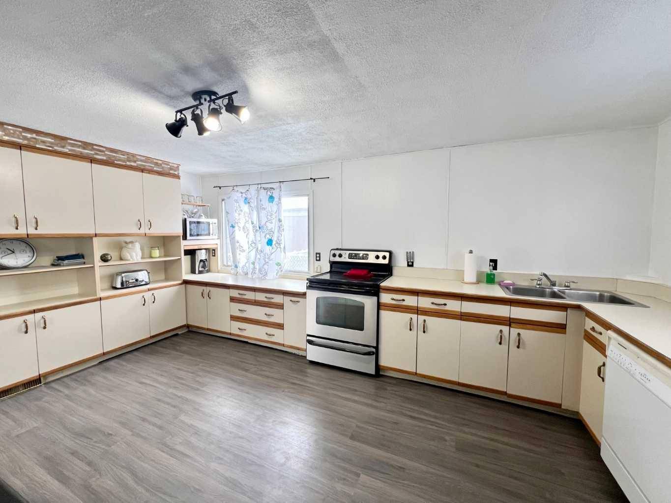 Calgary, AB T3B5N5,3223 83 ST NW #239