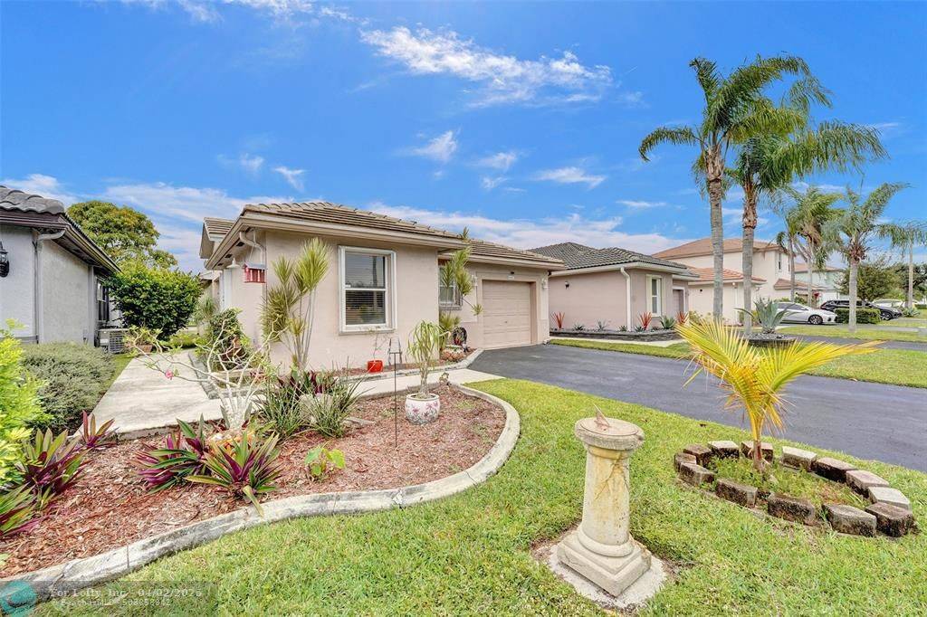 6967 NW 69th Ct,  Tamarac,  FL 33321