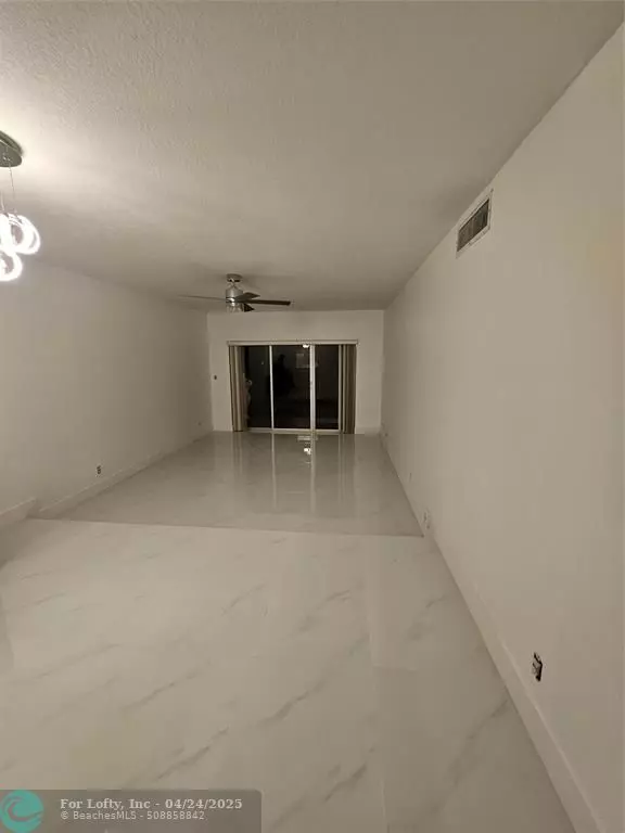 2700 Coral Springs Dr #302, Coral Springs, FL 33065
