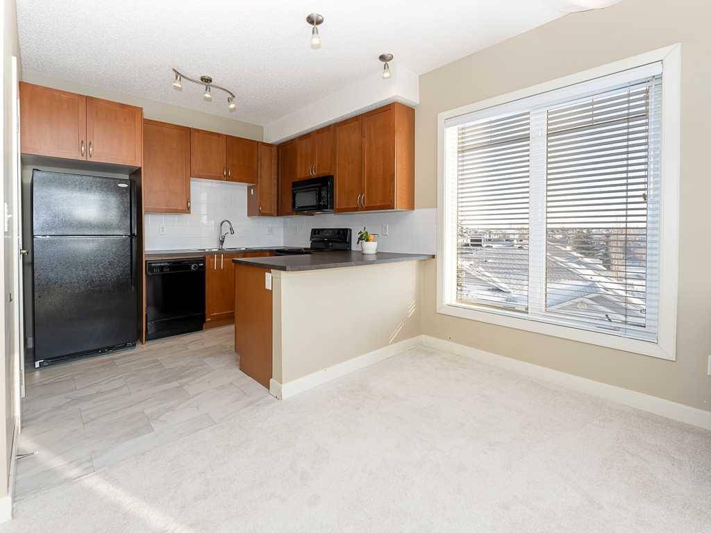 Calgary, AB T3K 0E3,108 Country Village CIR NE #403