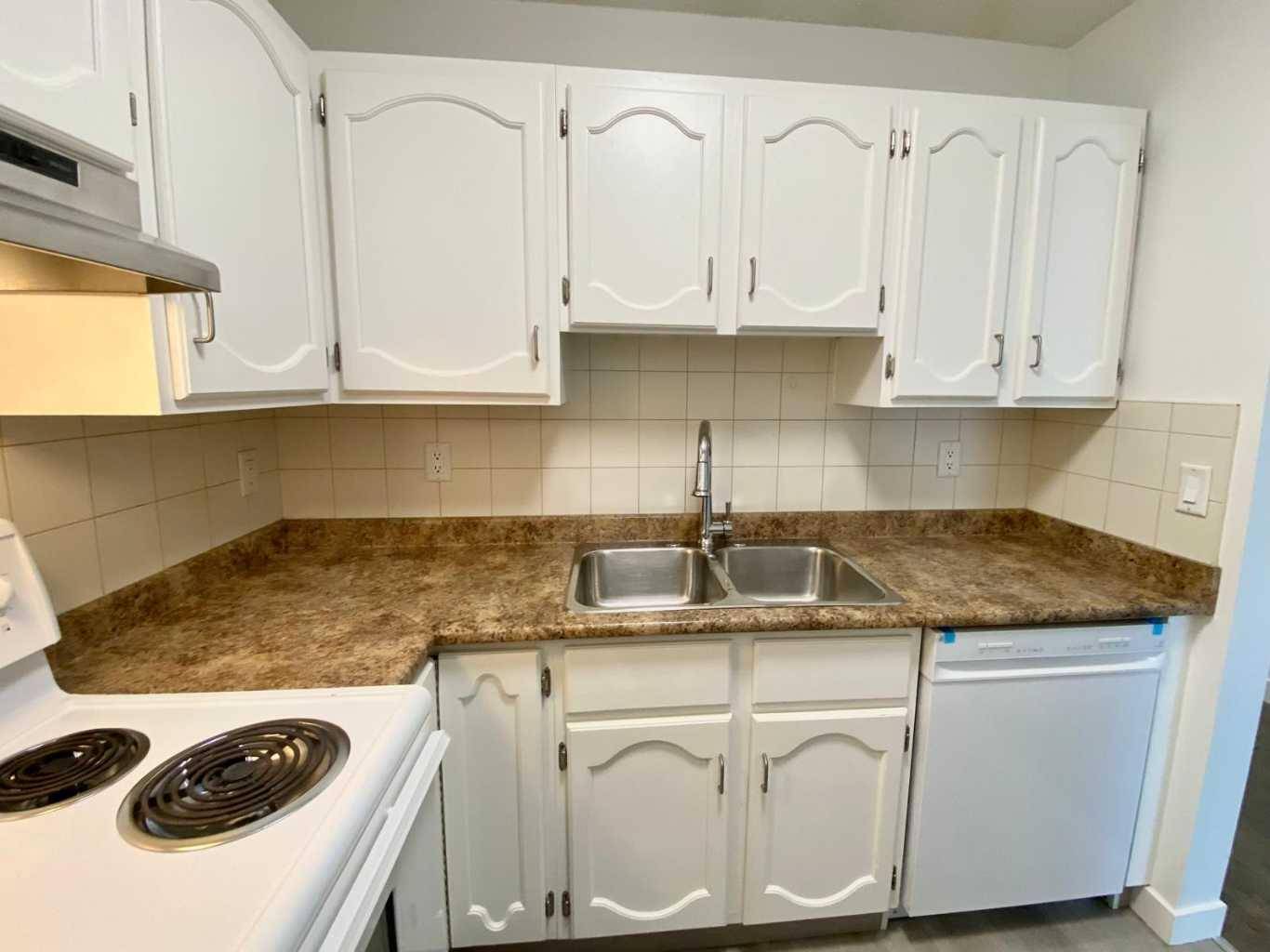 Calgary, AB T2V 0M3,611 67 AVE SW #302