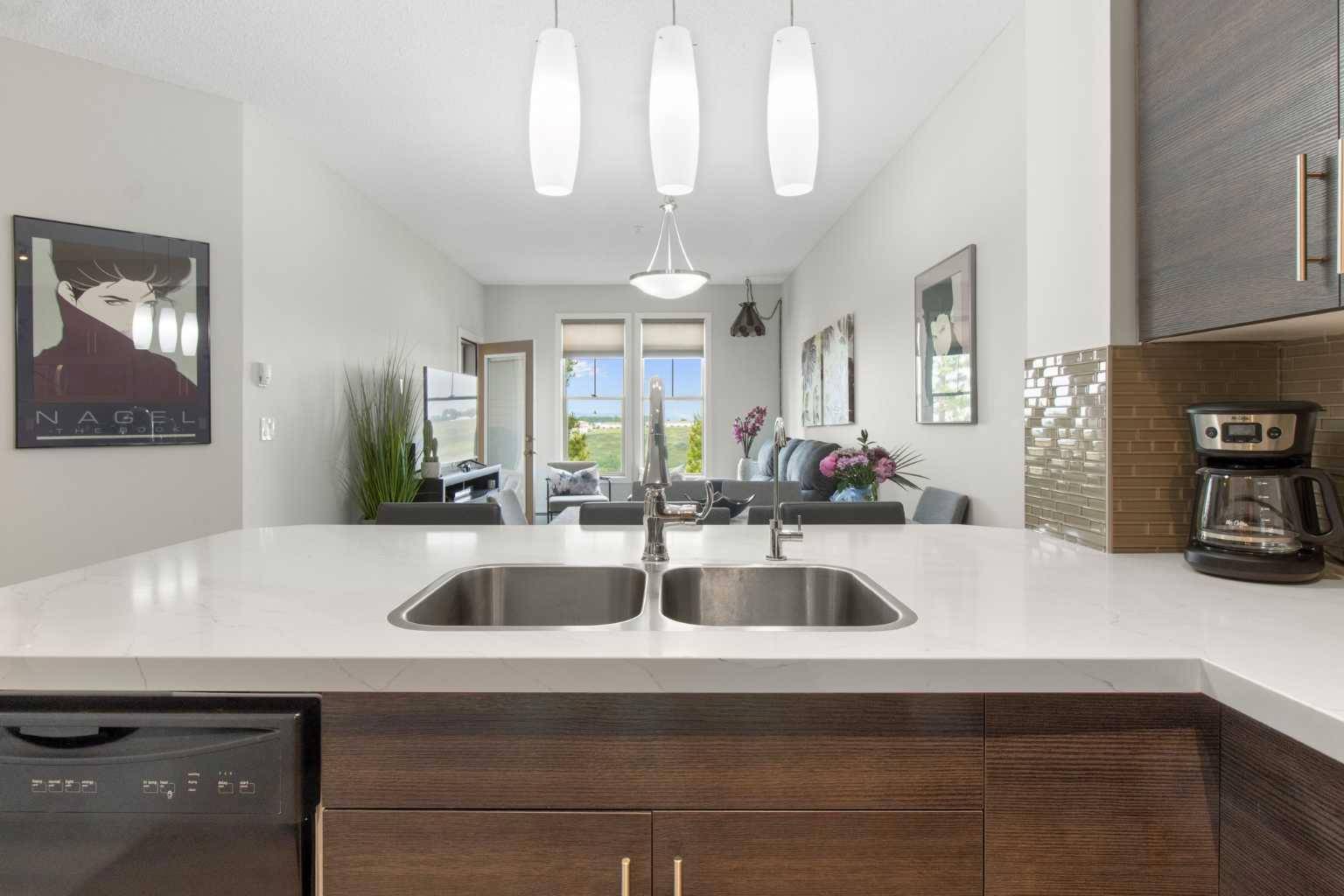 Cochrane, AB T4C 0H7,207 Sunset DR #324