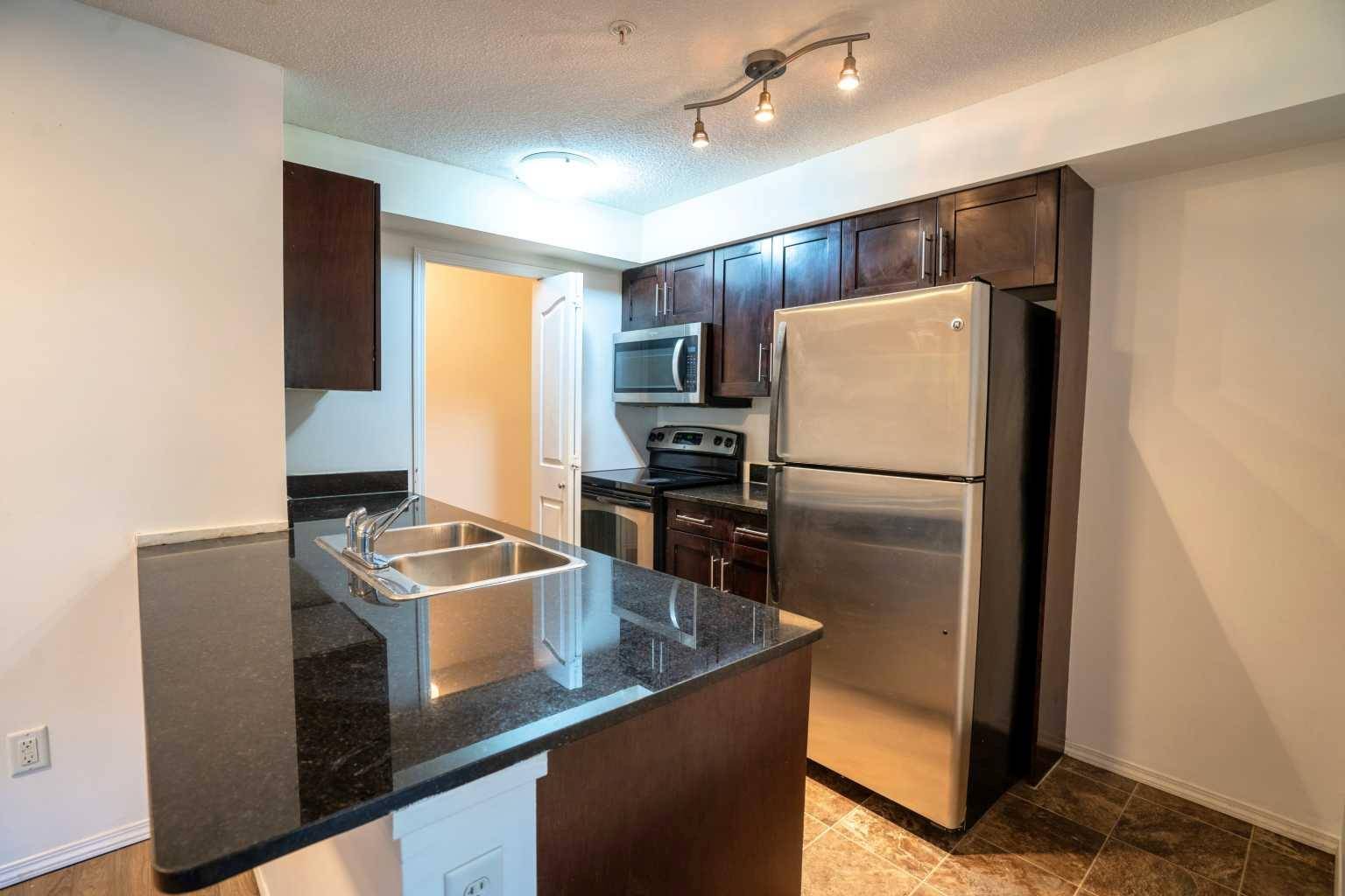 Calgary, AB T3B0N5,7130 80 AVE NE #207