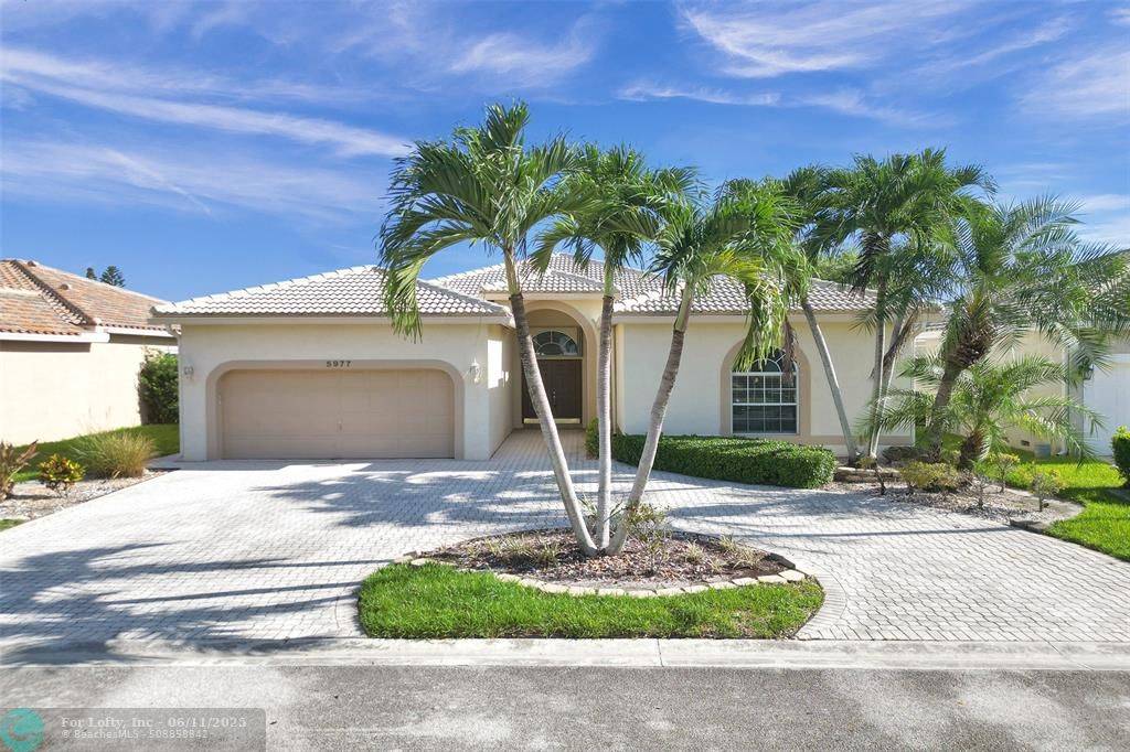 5977 NW 73rd Court, Parkland, FL 33067