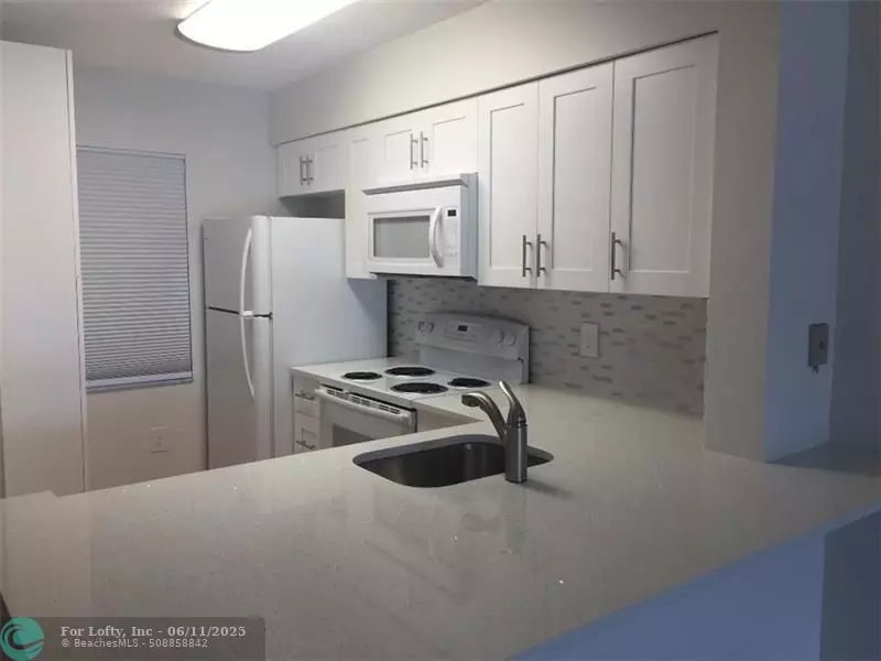 2236 N Cypress Bend Dr #209, Pompano Beach, FL 33069