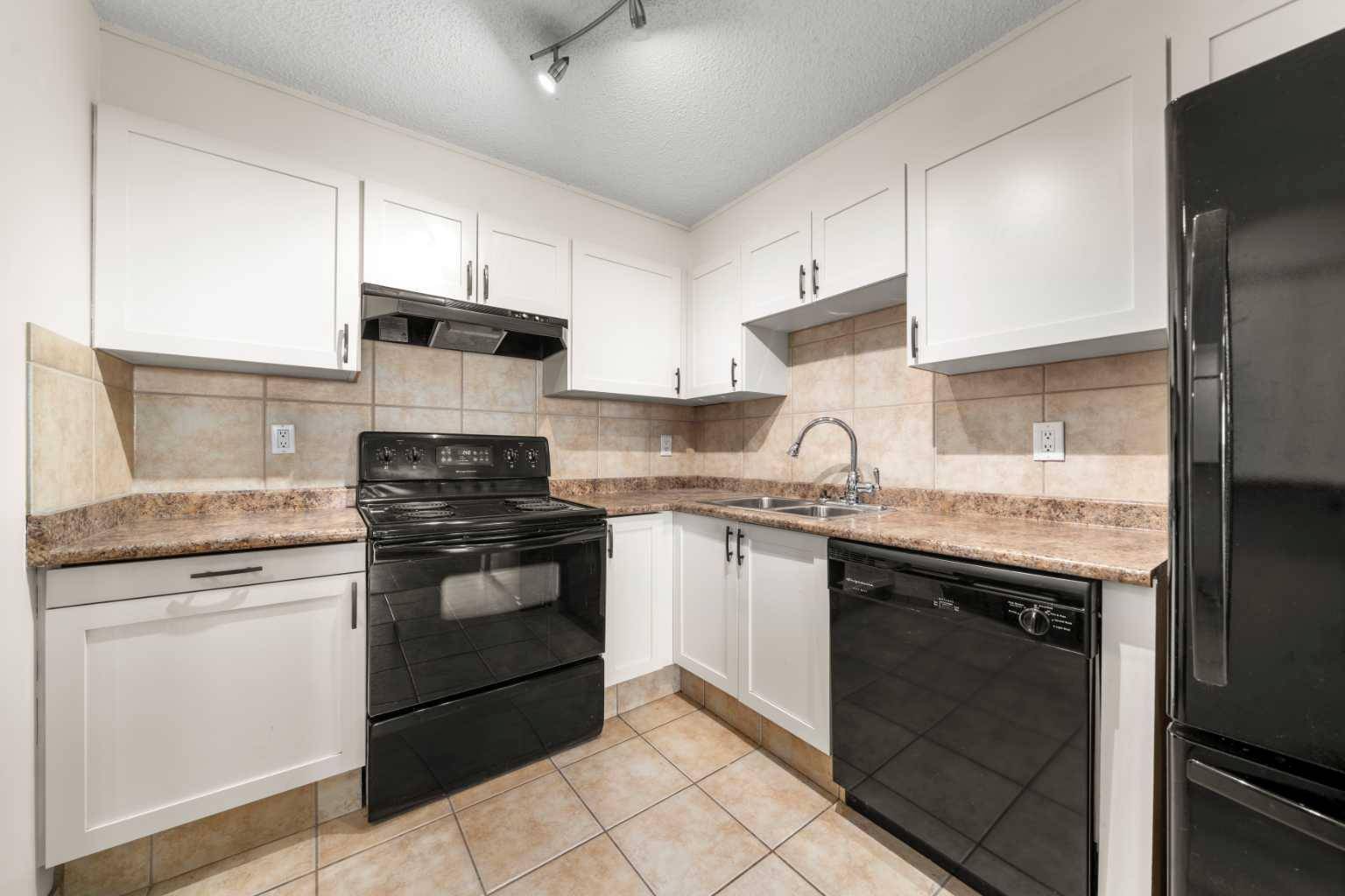Calgary, AB T3C0N6,1810 11 AVE Southwest #103