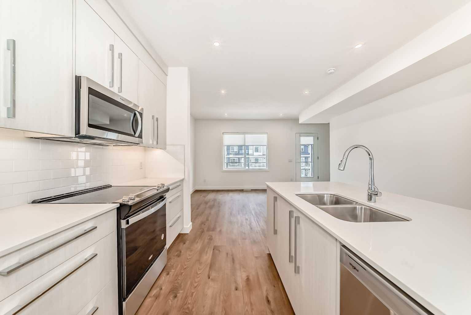 Calgary, AB T2X 5X4,135 Belmont Passage Southwest #405