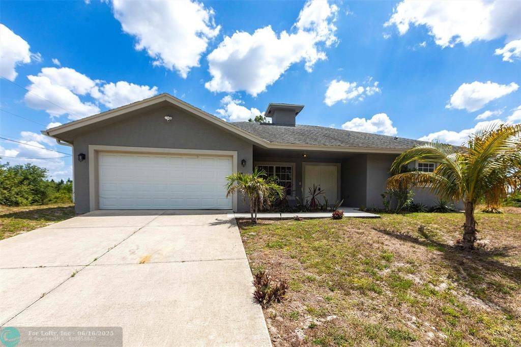 Lehigh Acres, FL 33972,906 E 10th St