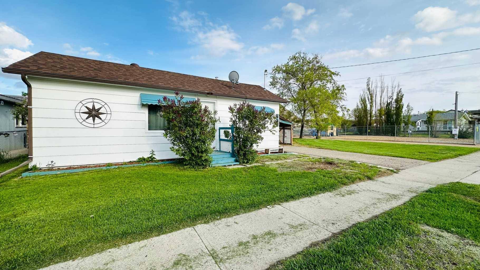 Drumheller, AB T0J 0Y6,718 1st  Street SW
