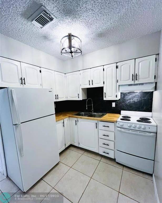 Dania Beach, FL 33004,49 SE 13th St
