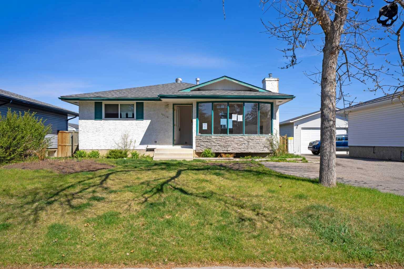 12112 Canfield RD SW, Calgary, AB T2W 1V2