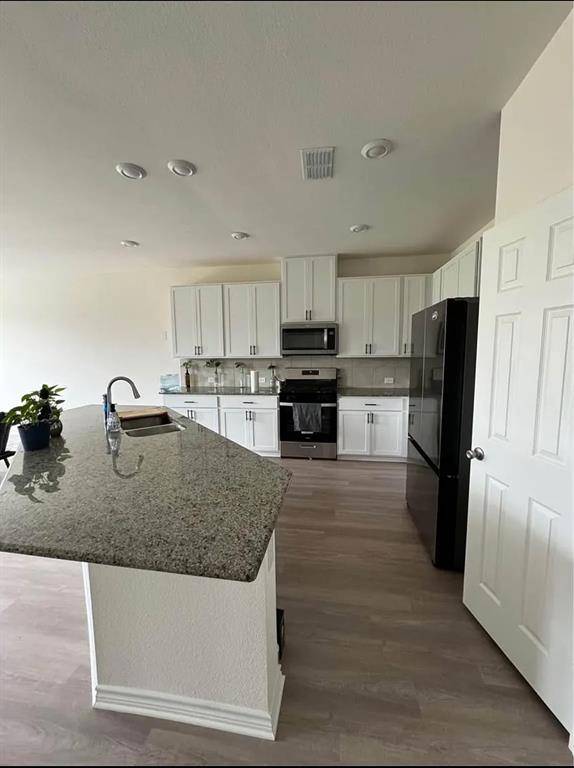 Aubrey, TX 76227,936 Adair Drive
