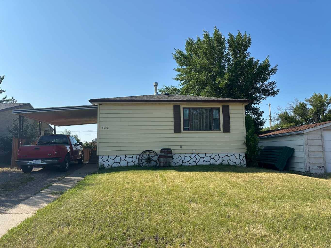 5008 42 AVE, Taber, AB T1G 1A6