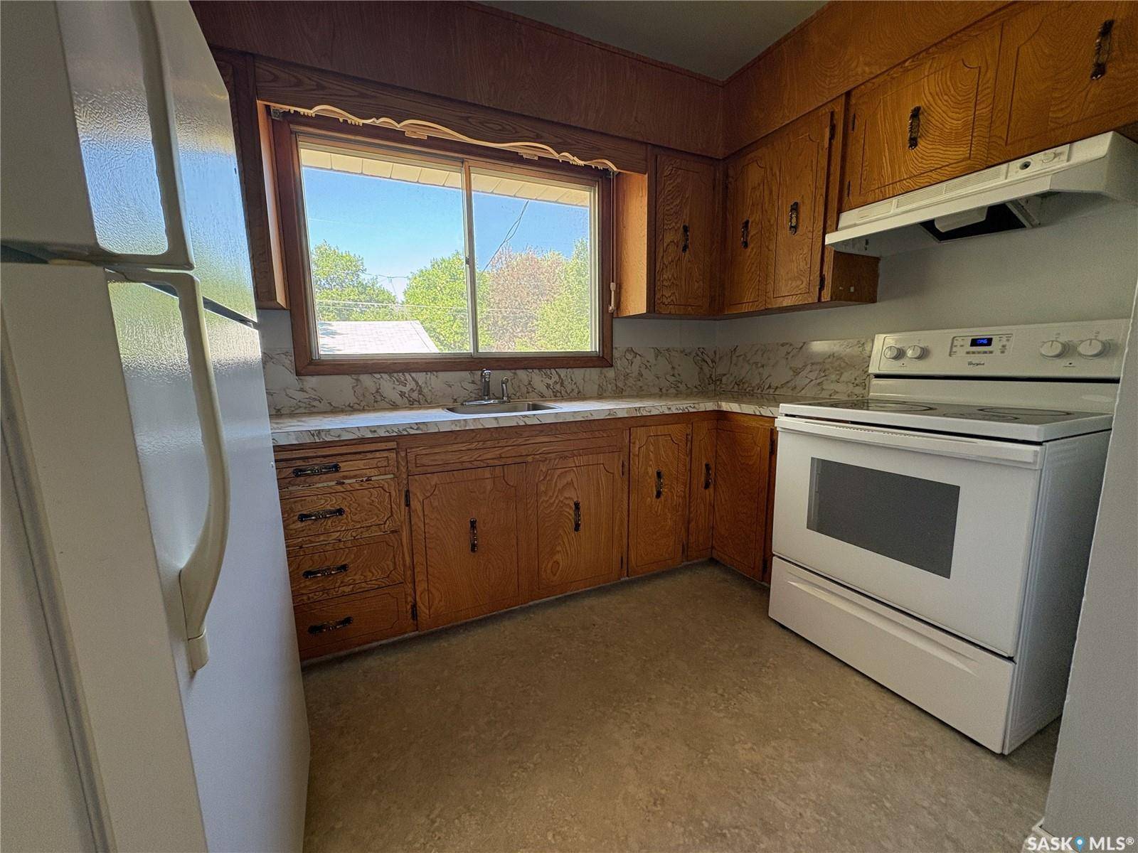 Swift Current, SK S9H 2R7,830 8th AVENUE NE