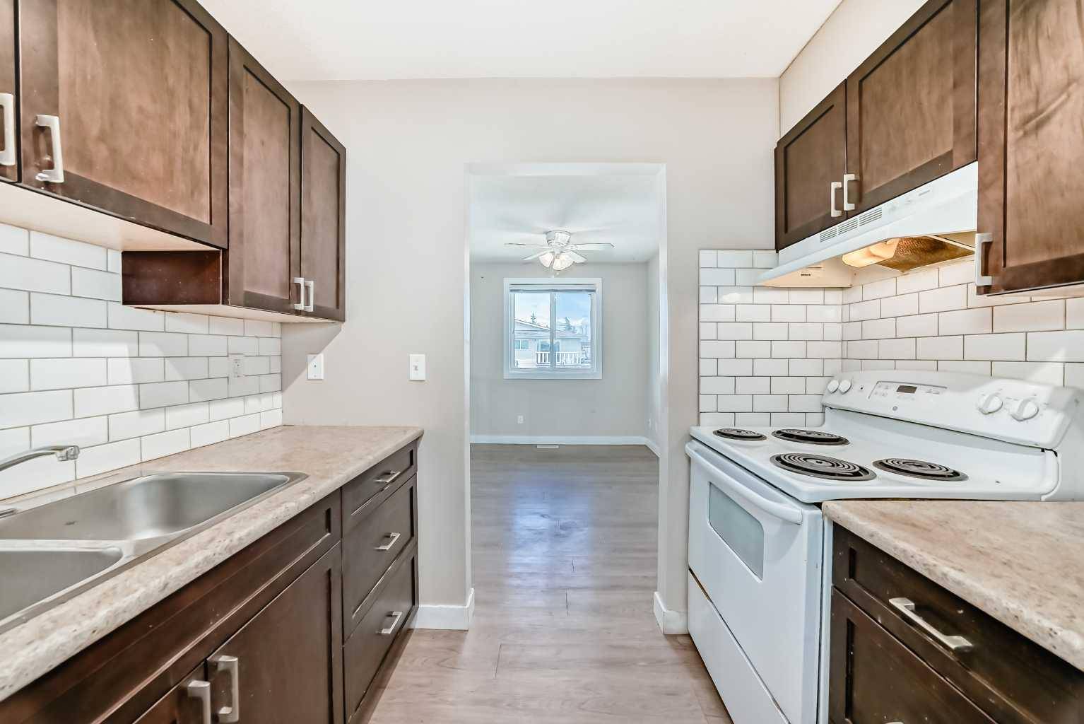 Calgary, AB T2A 5E7,1404 43 ST Southeast #A. B. C. D
