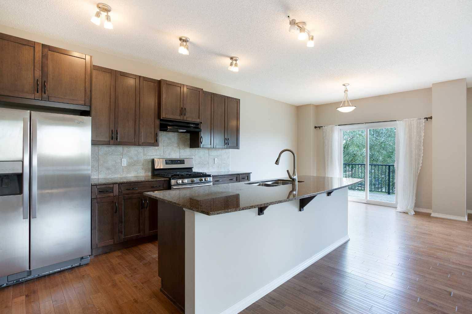 Okotoks, AB T1S 0M8,32 Drake Landing HL