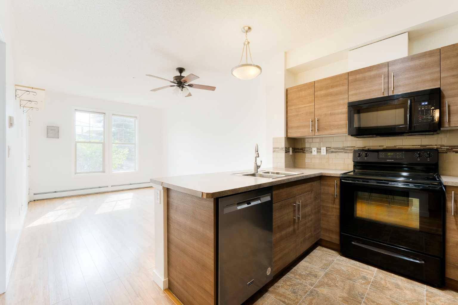 Cochrane, AB T4C 0H7,207 Sunset DR #111