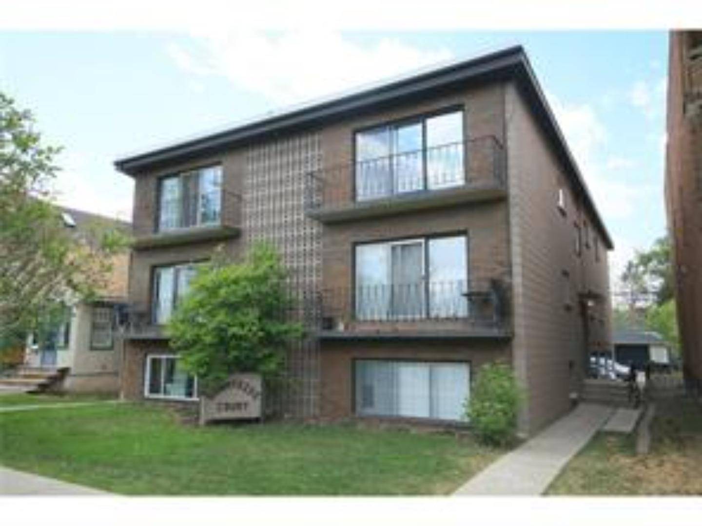 916 3 AVE NW #1, Calgary, AB T2N 0J6