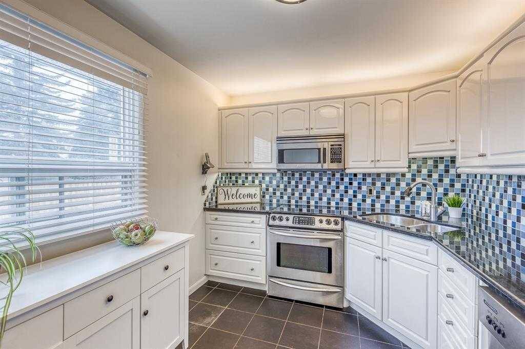 Calgary, AB T3E 4G6,5104 Grove Hill RD SW