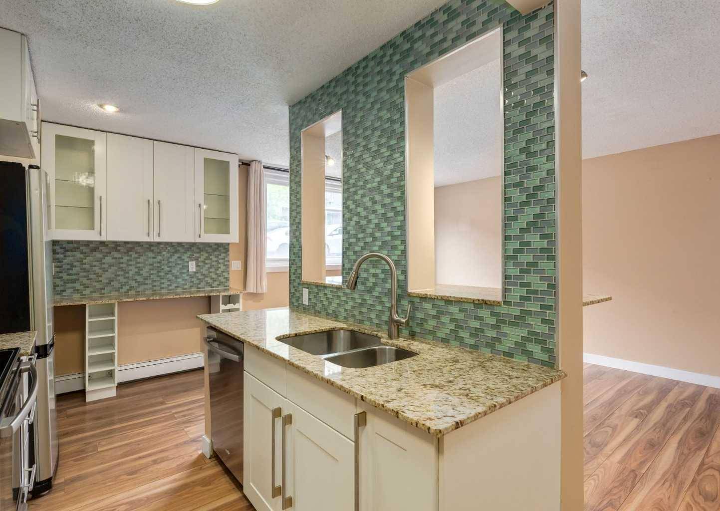 Calgary, AB T2T 4E3,1817 16 ST Southwest #102
