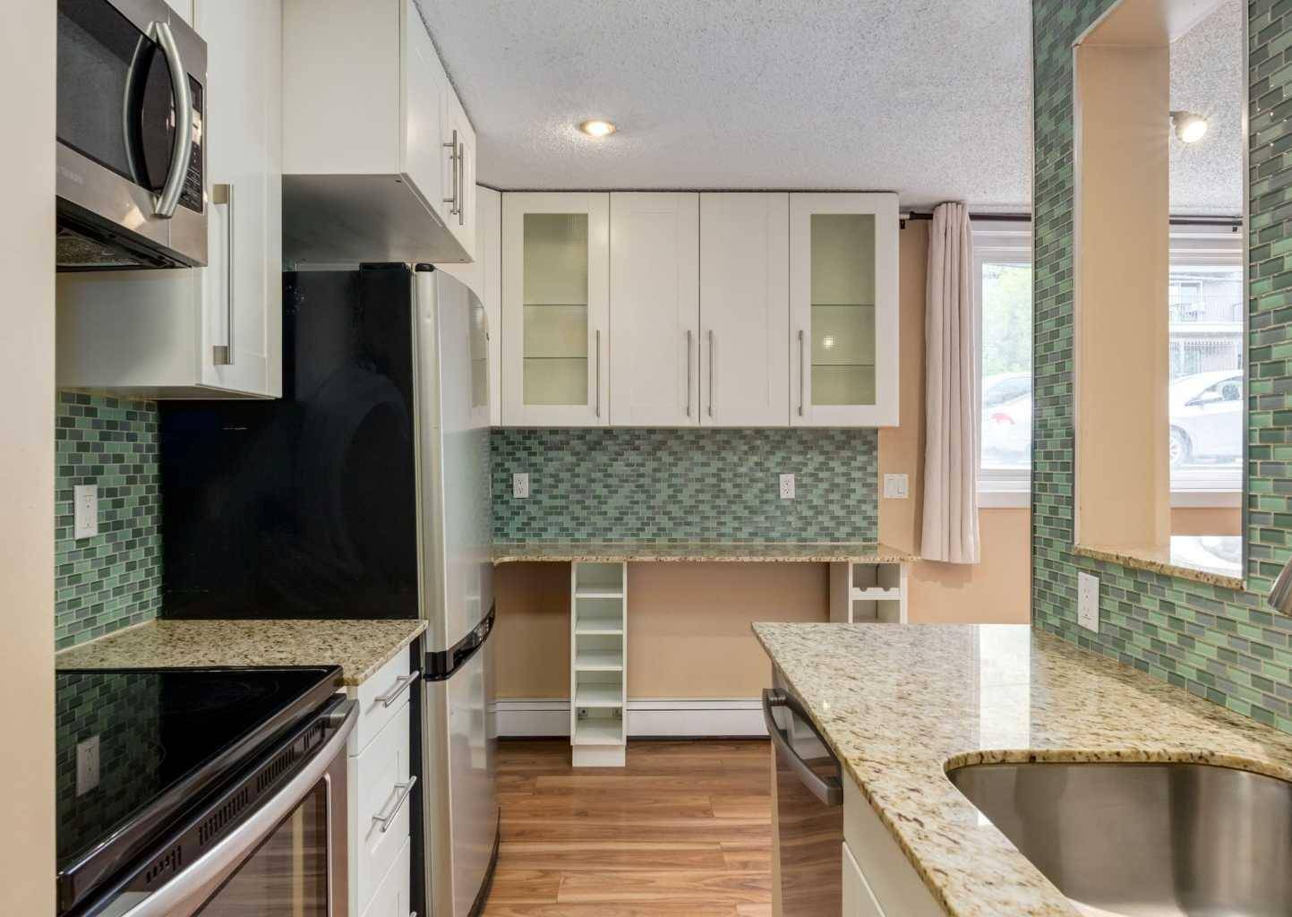 Calgary, AB T2T 4E3,1817 16 ST Southwest #102