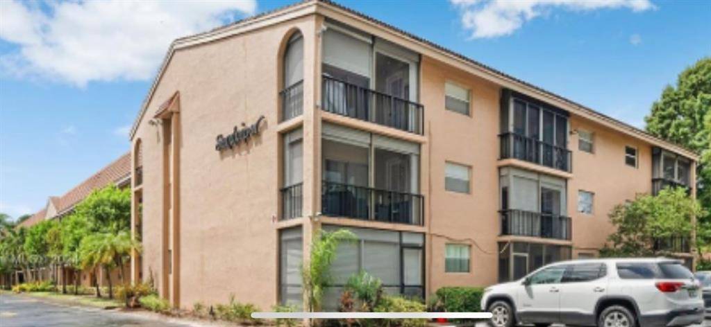 2700 Coral Springs Dr #302, Coral Springs, FL 33065