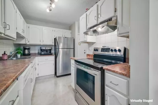 Calgary, AB T2V 0M3,611 67 AVE SW #102