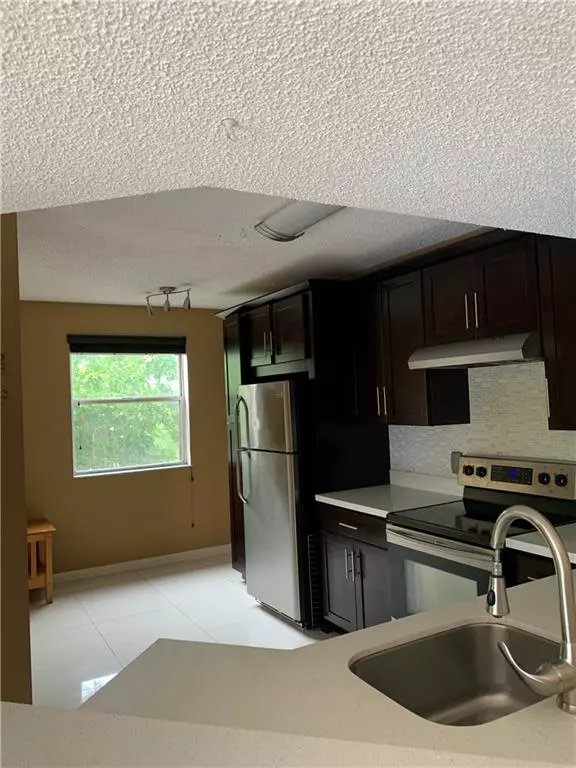 8891 Wiles Rd #308, Coral Springs, FL 33067