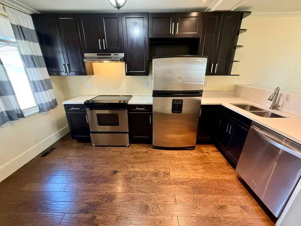 Calgary, AB T2M 1E1,722 20 AVE NW