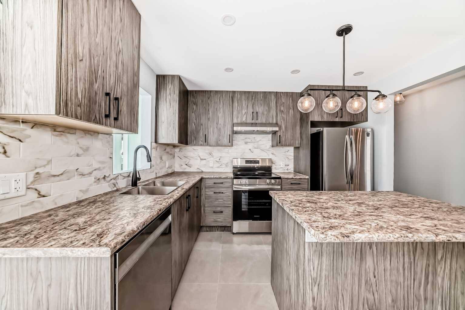 Calgary, AB T2J 1K5,9408 5 ST SE