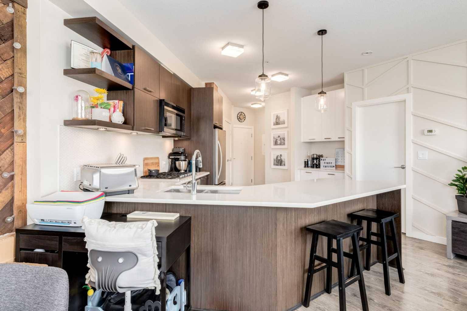 Calgary, AB T2E 3S7,707 4 ST NE #312