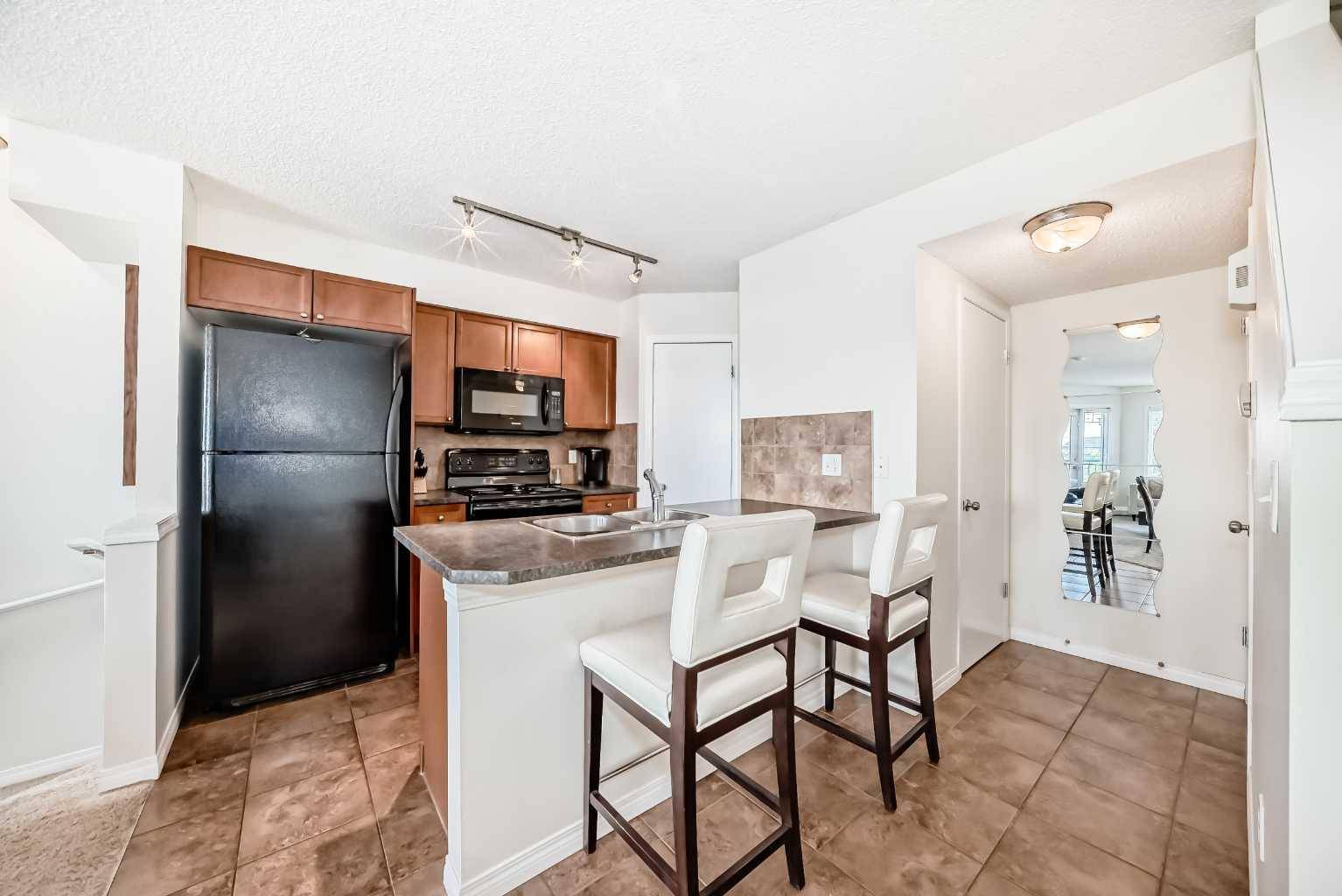 Calgary, AB T2Z 0C5,21 McKenzie Towne Gate Southeast #12