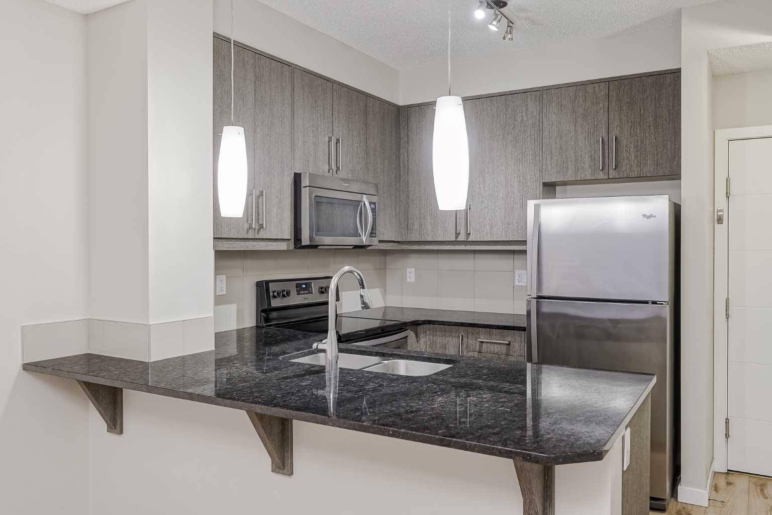 Calgary, AB T3M 1M6,402 Marquis LN SE #205