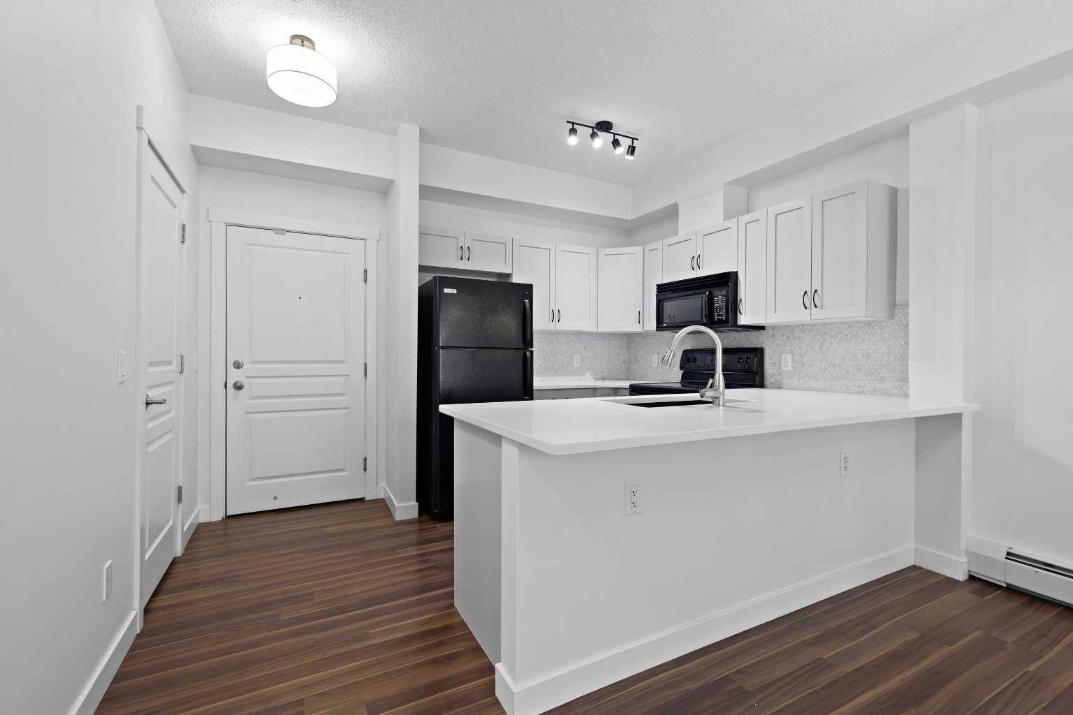 Calgary, AB T3H 0K1,211 Aspen Stone BLVD SW #1123