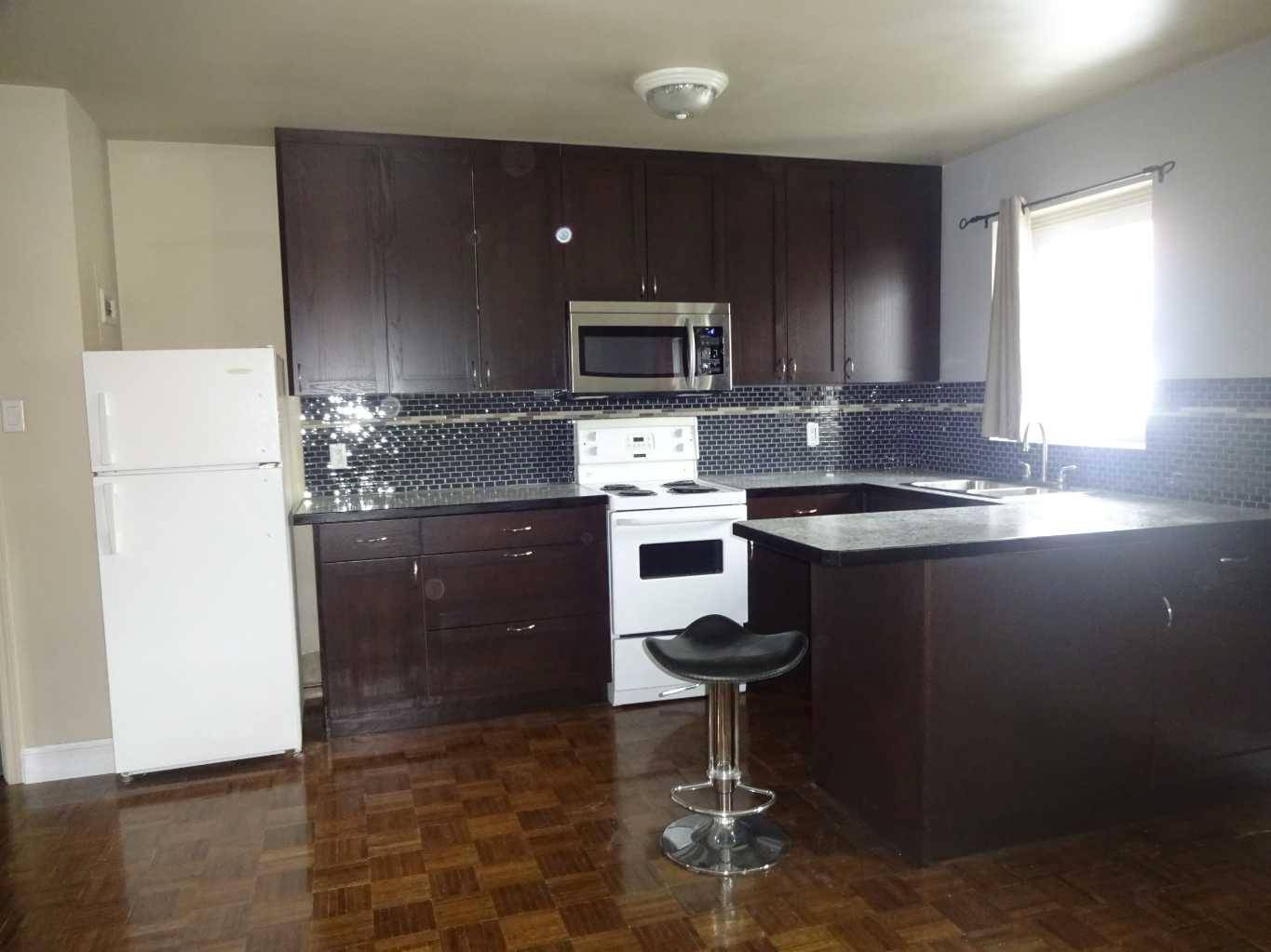 1027 12 AVE Southwest #204, Calgary, AB T2R 0J5