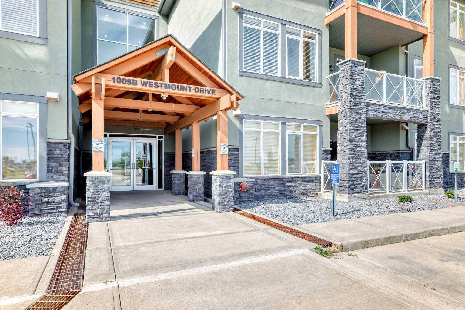 Strathmore, AB T1P0C3,1005B Westmount DR #207