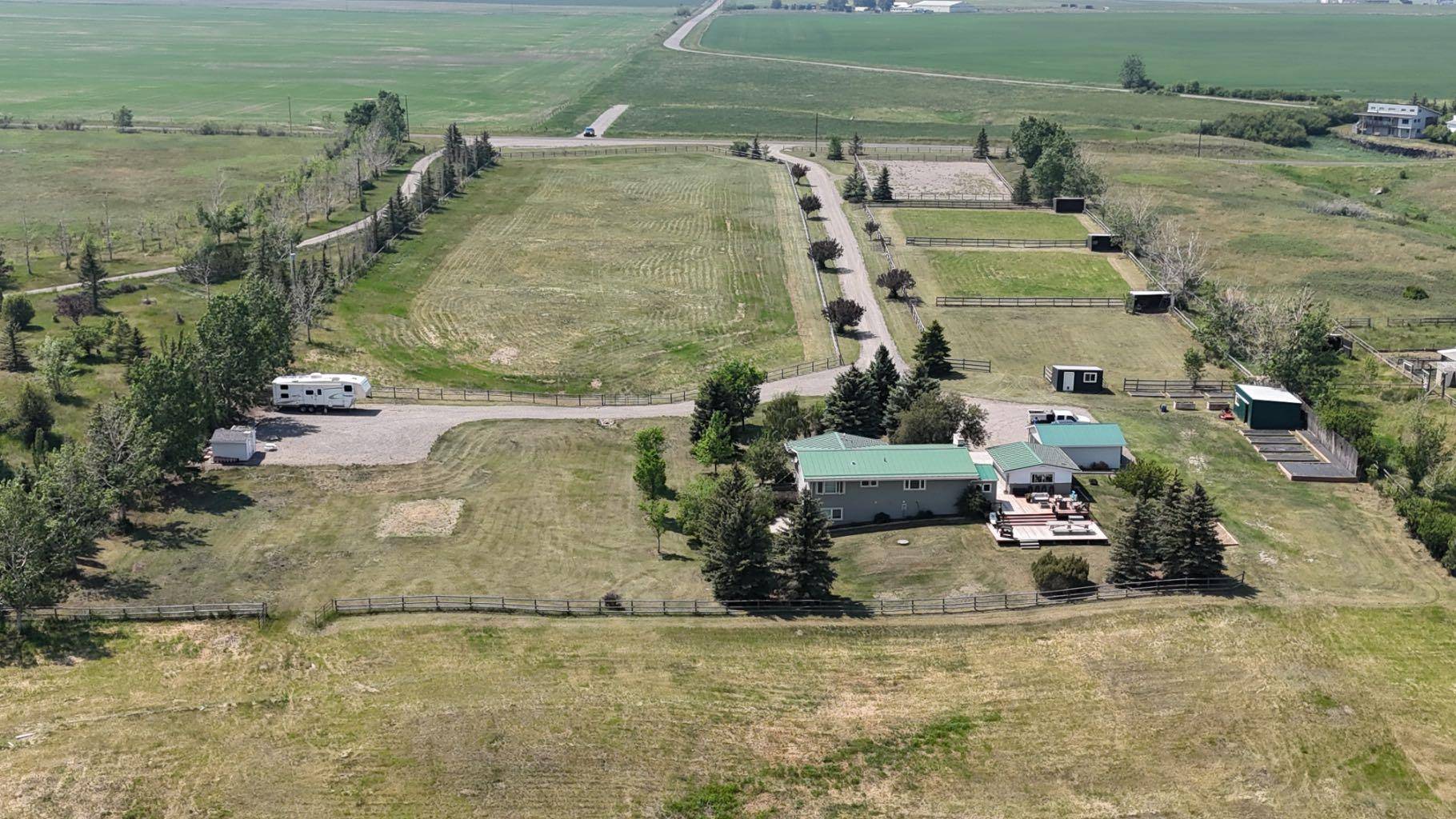 562124 40 ST E, Rural Foothills County, AB T1V 1N2