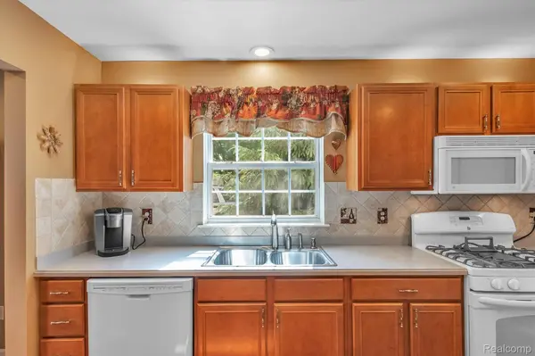 MI 48360,289 Four Seasons DR #55