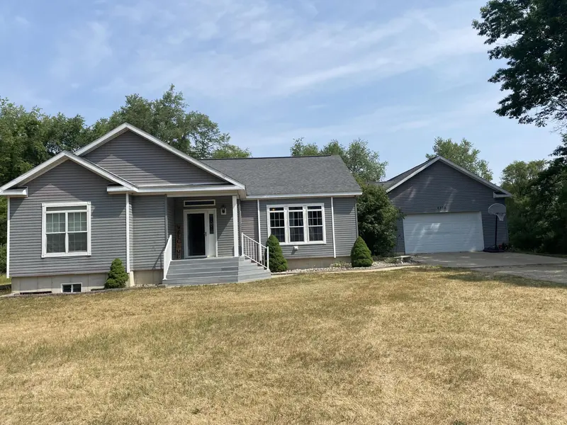 6370 Clubhouse DR E, Canadian Lakes, MI 49346
