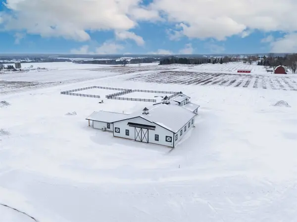 7788 Sayler RD, Acme Twp, MI 49690