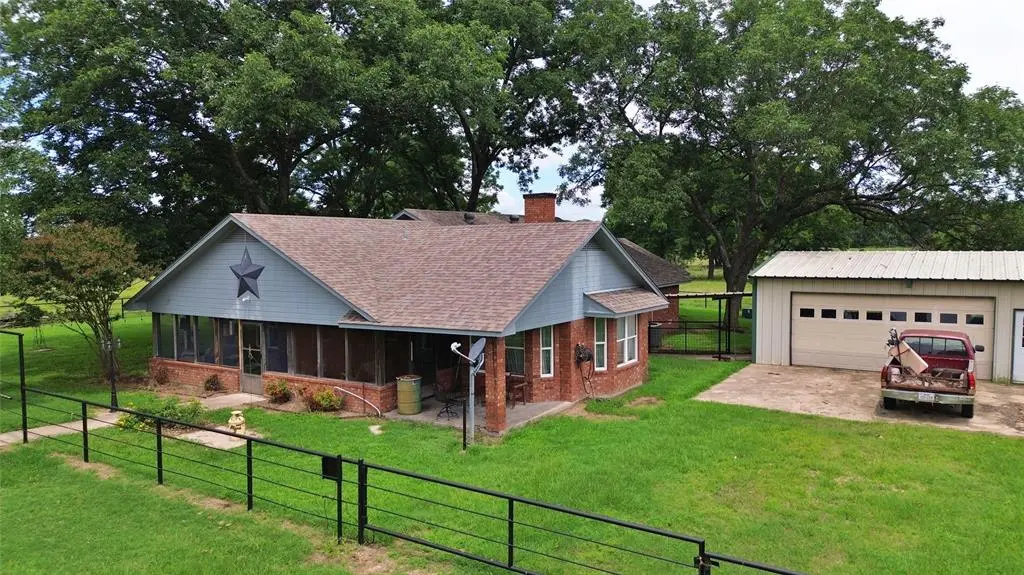 695 County Road 1210, Lake Creek, TX 75450