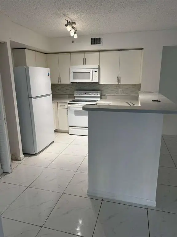 Pompano Beach, FL 33073,4856 N State Road 7 #103